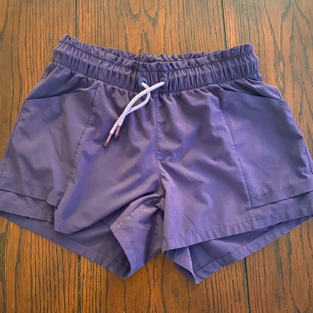 Athleta, deep purple shorts, size 12